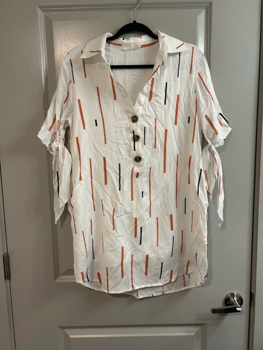 Lush White Button-Front Tunic with Orange and Navy Linear Print